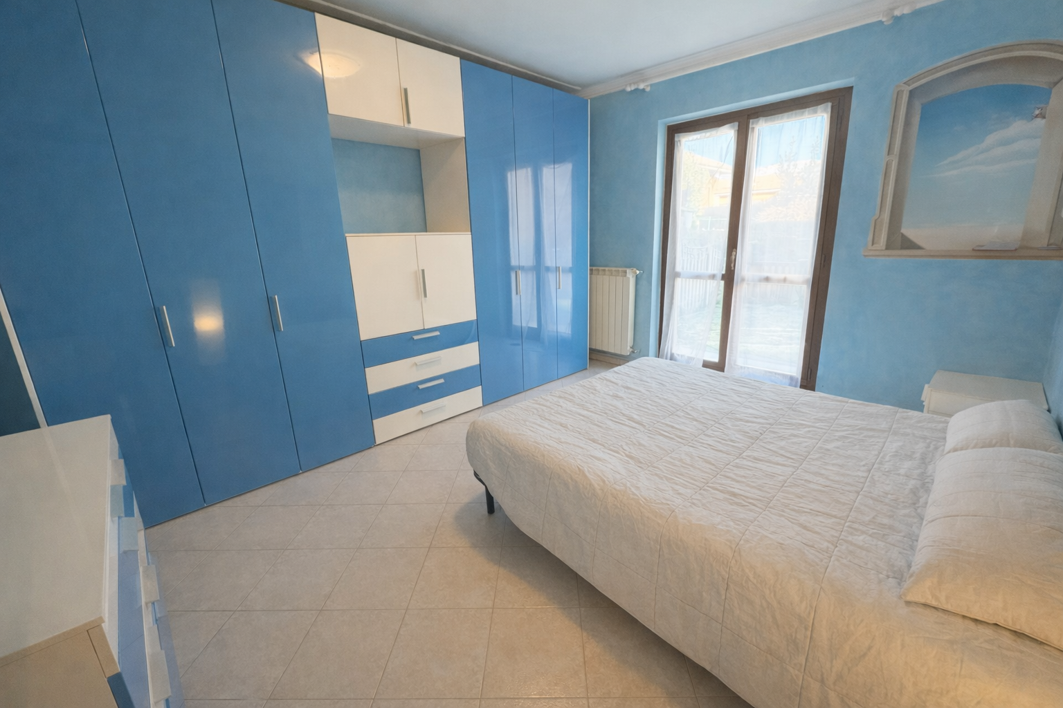 APPARTAMENTO CON GIARDINO PRIVATO