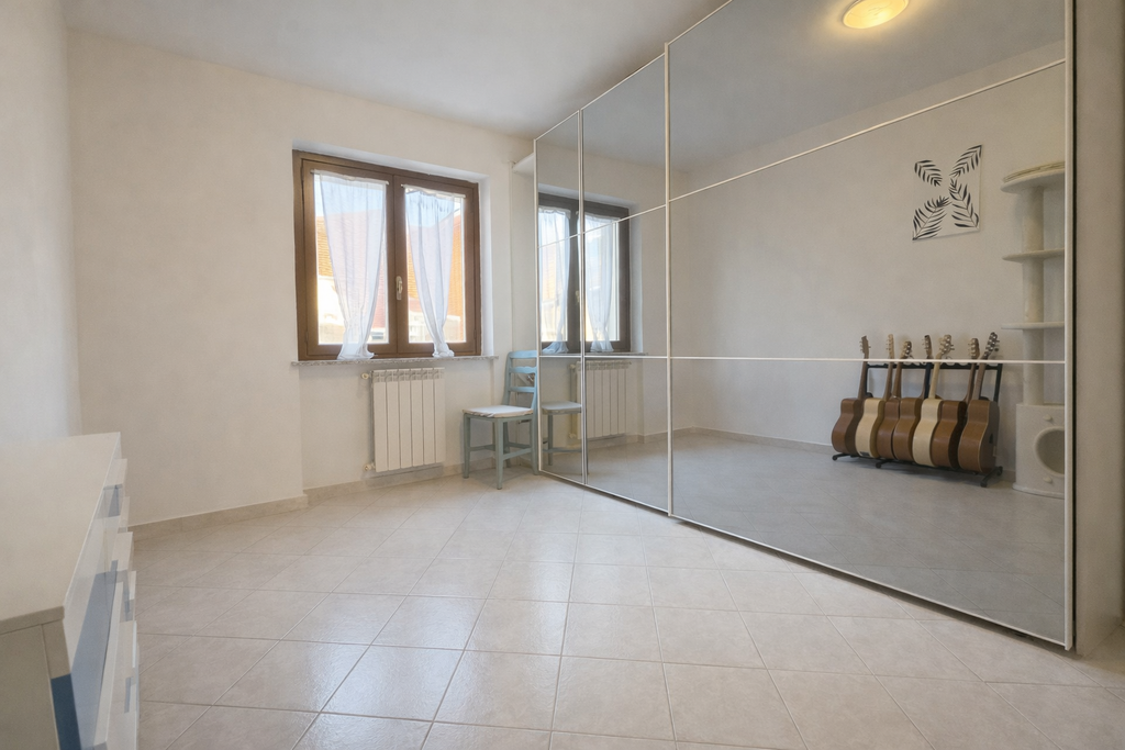 APPARTAMENTO CON GIARDINO PRIVATO