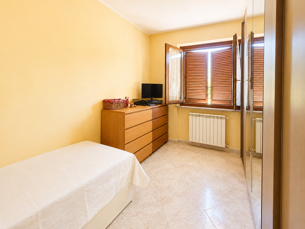 APPARTAMENTO CON MANSARDA A SANT'AMBROGIO