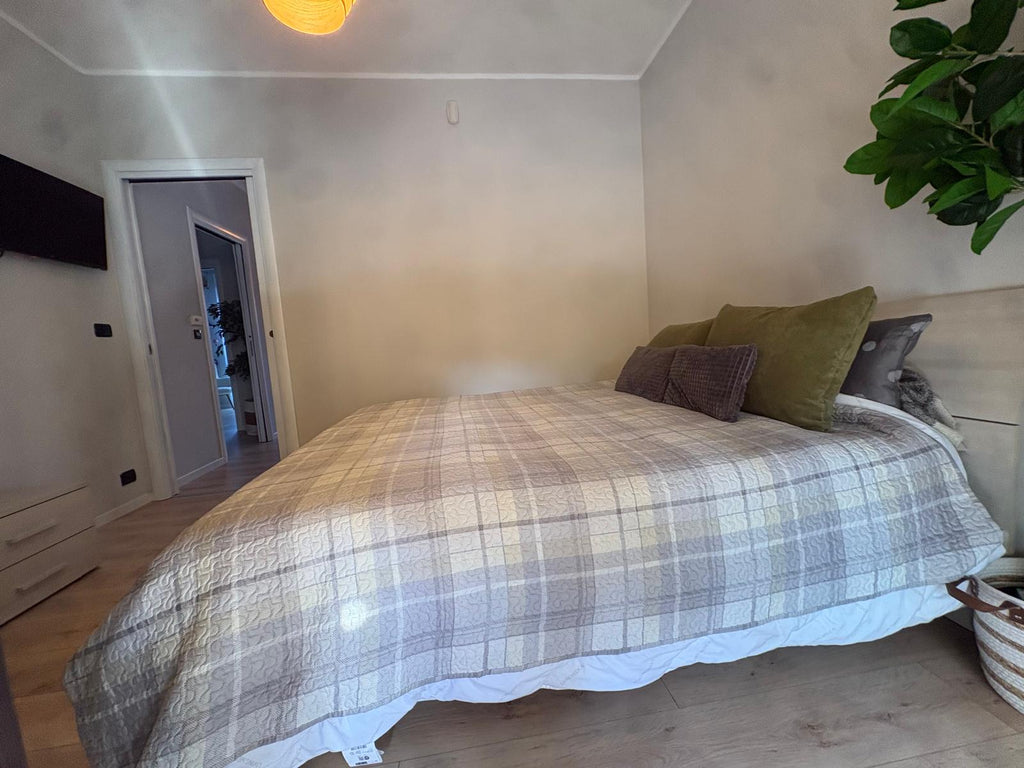 APPARTAMENTO CON GIARDINO PRIVATO